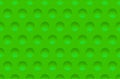 Seamless abstract green texture background with round cavities